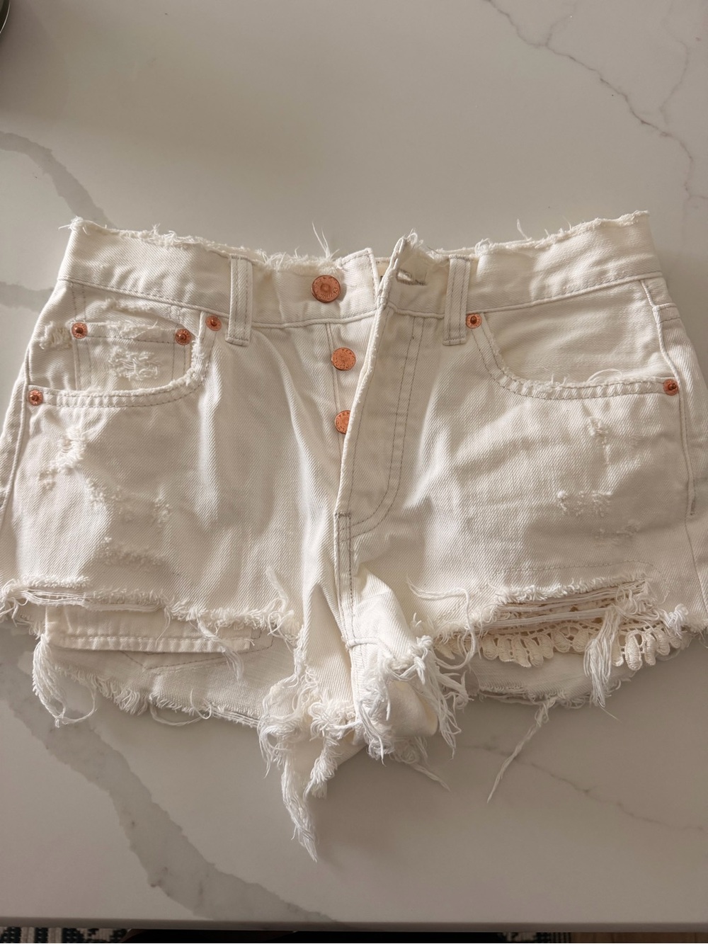 We The Free White Distressed Denim Cutoff Shorts
